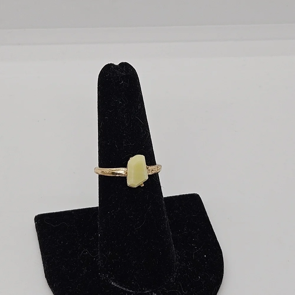gold tone ring with light yellow faux stone size 6.5